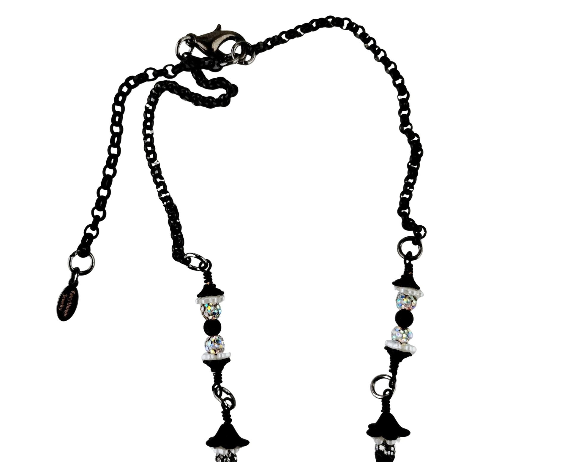 Black chain necklace with decorative beads on a white background