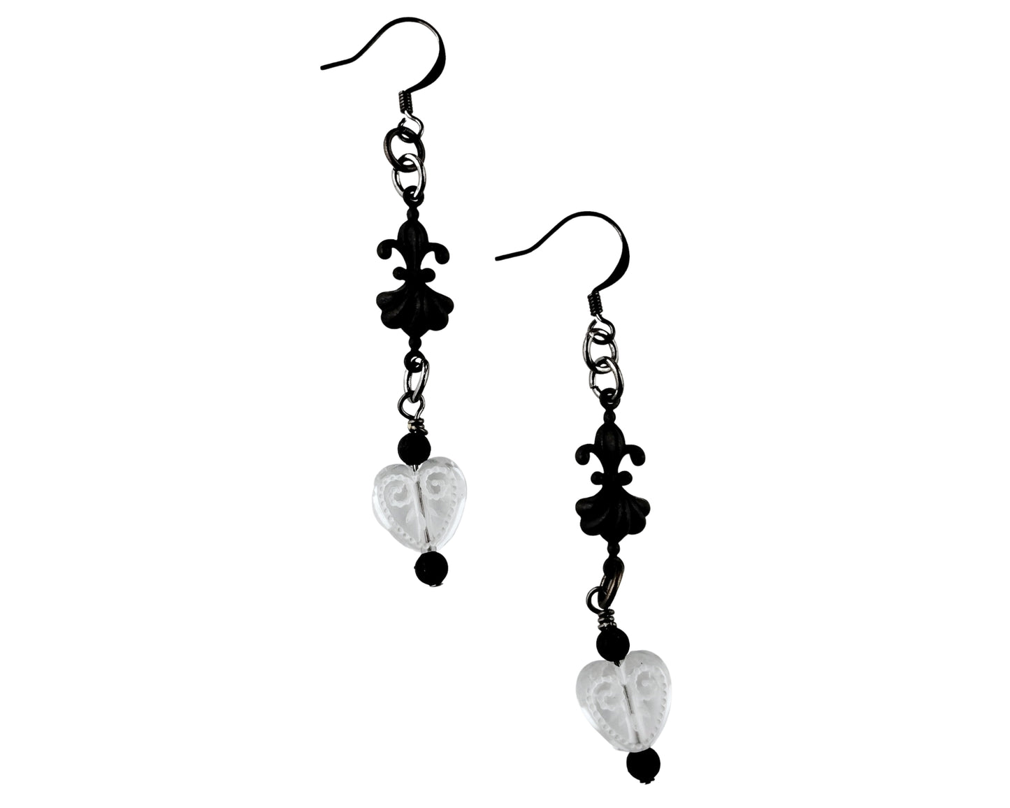 Black and silver heart-shaped earrings on a white background