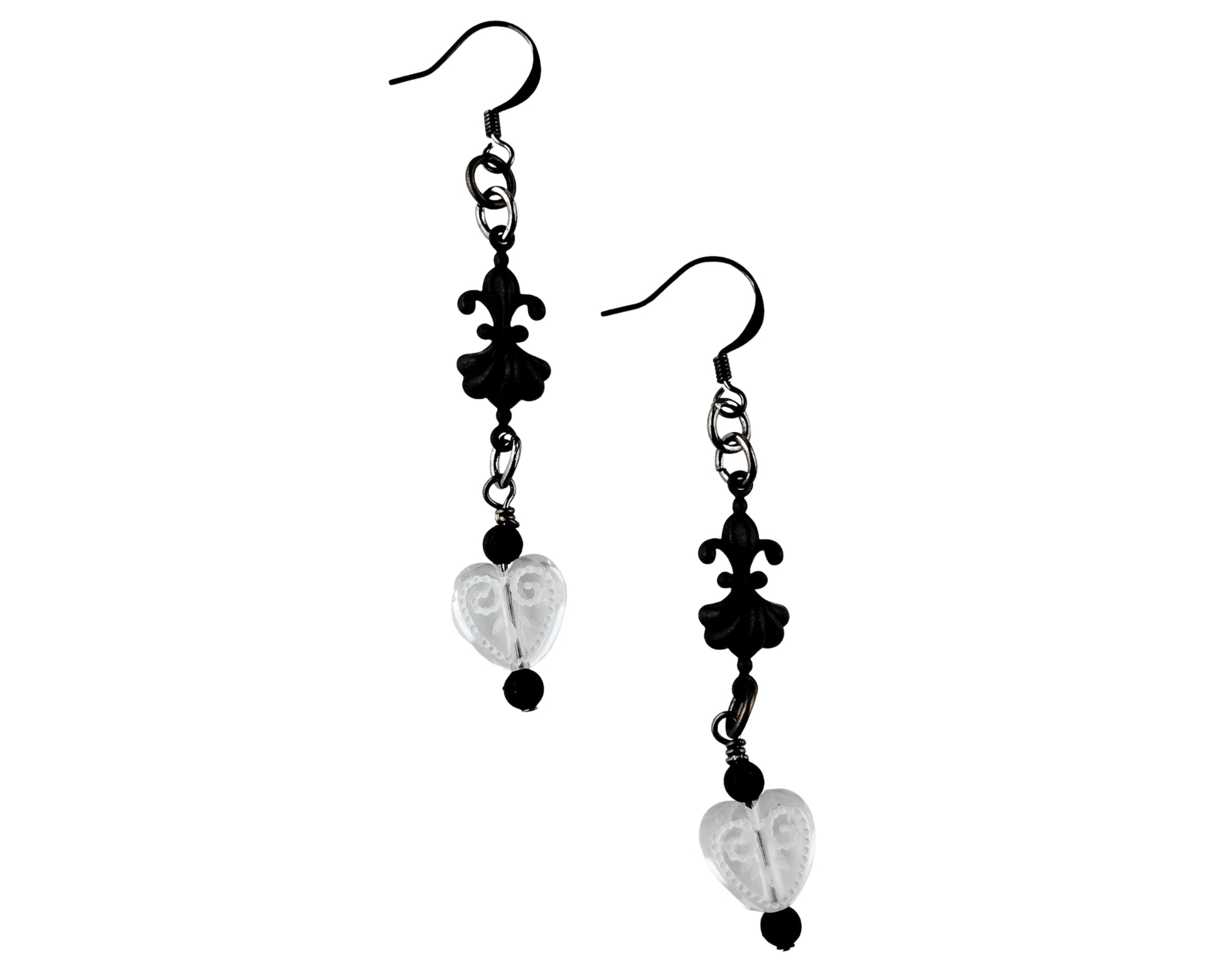 Black and silver heart-shaped earrings on a white background