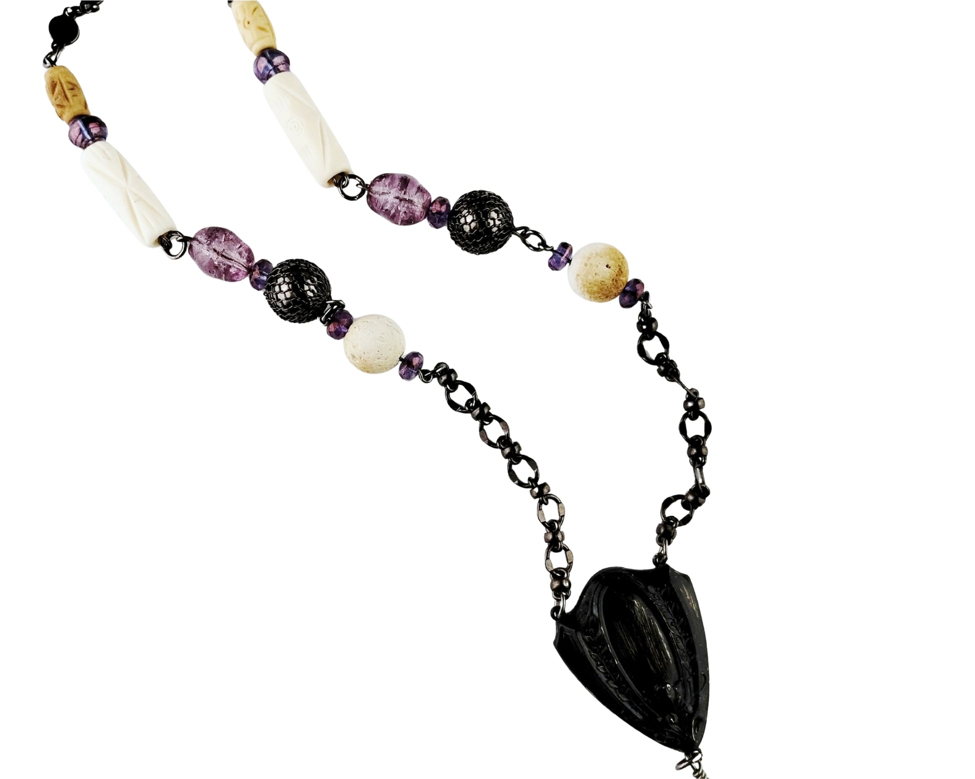 Necklace with black, purple, and white beads on a white background