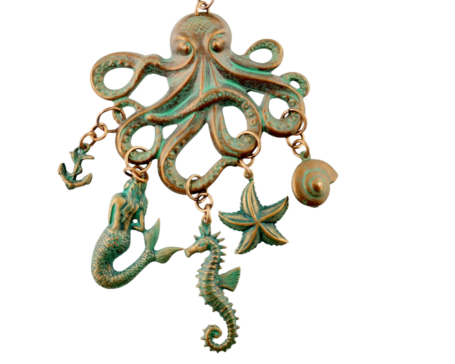 Decorative pendant with octopus, mermaid, seahorse, and starfish on a white background