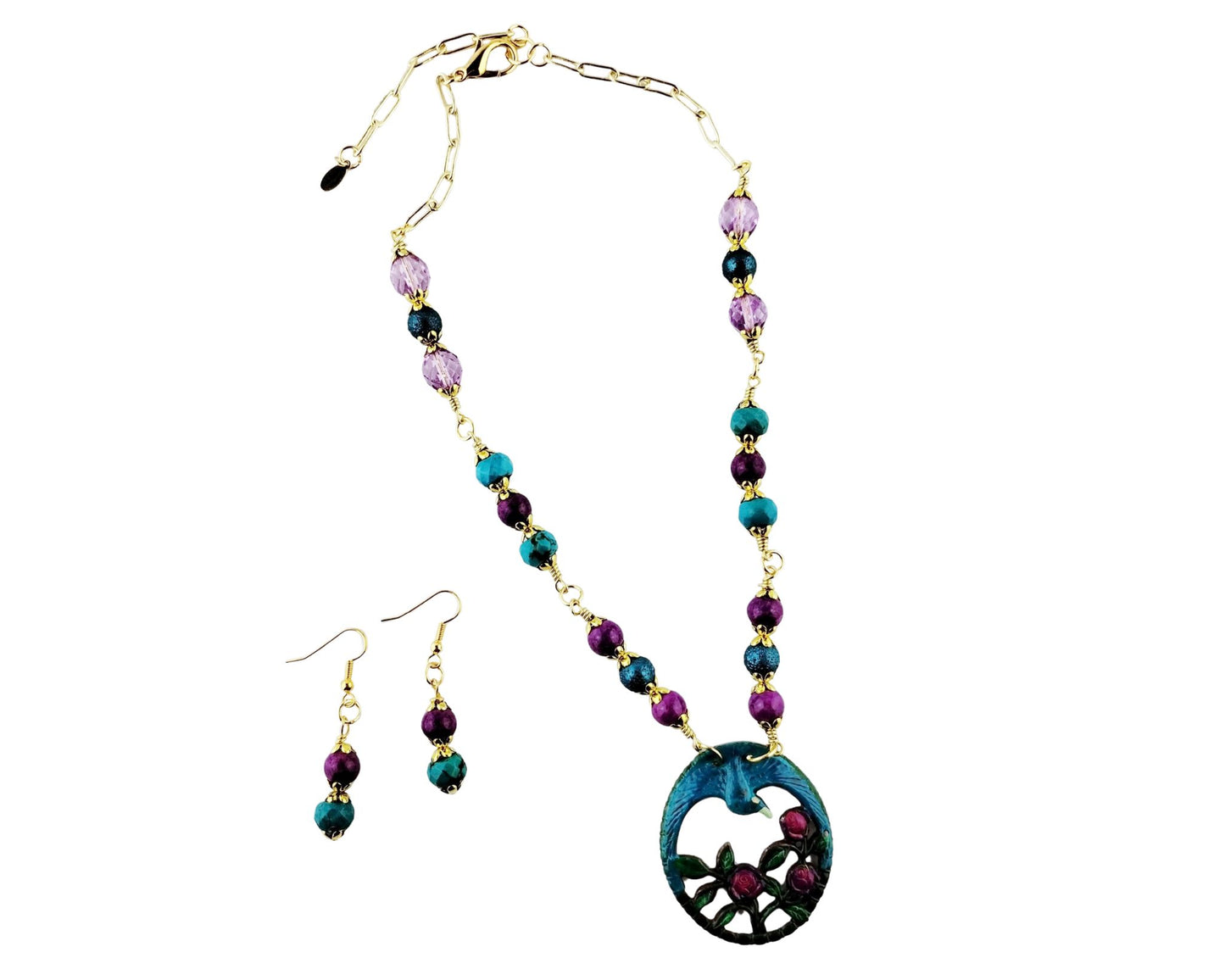 Jewelry set with necklace and earrings on a white background
