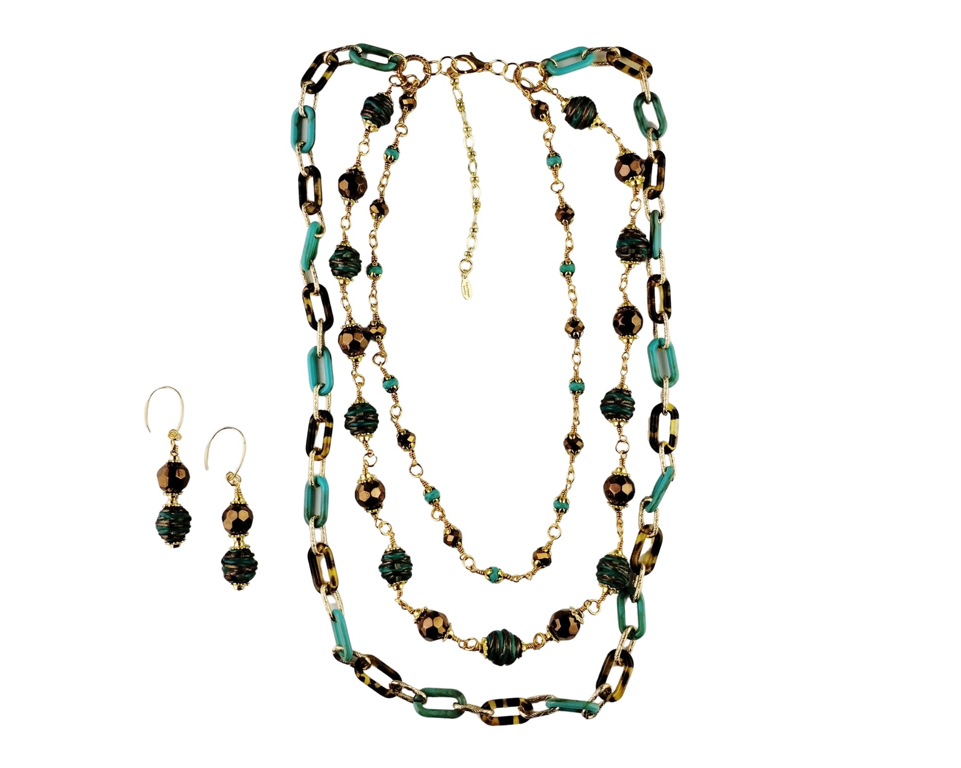 Jewelry set with necklace and earrings on a white background