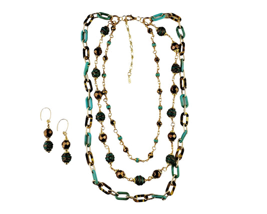 Jewelry set with necklace and earrings on a white background