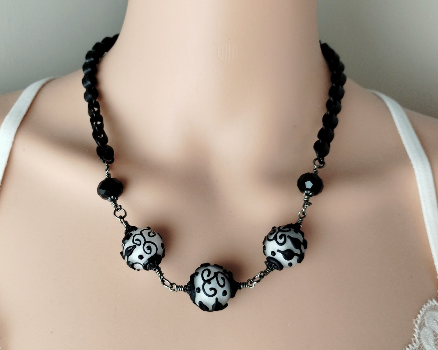 Black & White necklace on a mannequin 