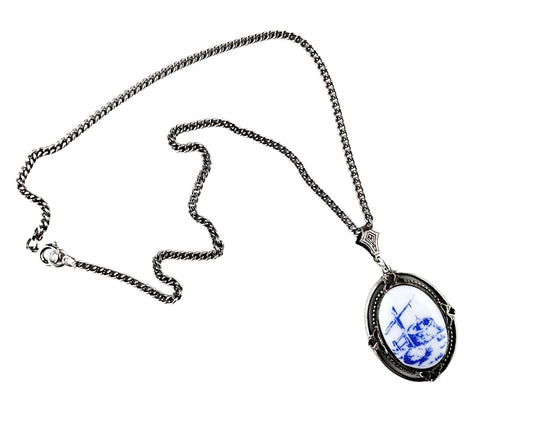 Handmade Delftware-inspired necklace with blue and white well scene